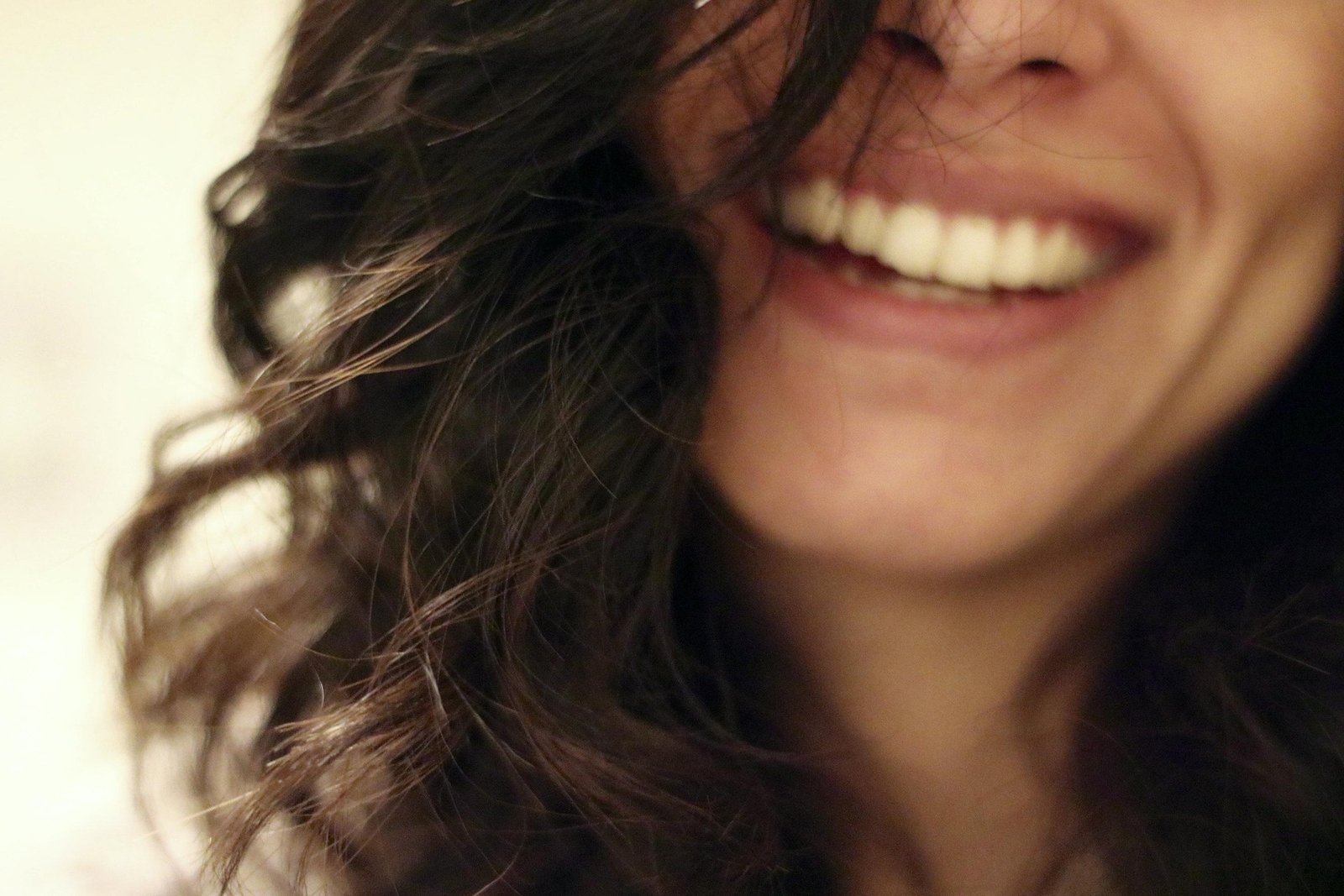 A woman with a natural, relaxed smile